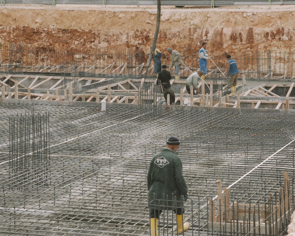 Concrete form boards leveled and staked with rebar reinforcement